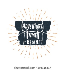 Hand drawn textured vintage Backpack and white "Adventure time begin" inspirational lettering. Vector Backpack symbol with sunburst