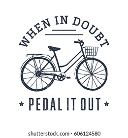 Hand drawn textured vintage label with bicycle vector illustration and inspirational lettering. When in doubt, pedal it out.