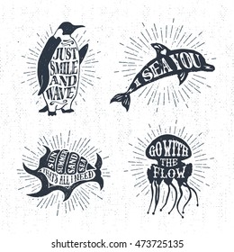 Hand drawn textured vintage labels set with penguin, dolphin, shell, jellyfish vector illustrations, and inspirational lettering.