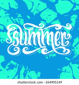 Hand drawn textured white word Summer over bright blue and aqua-green artistic paint splashes.