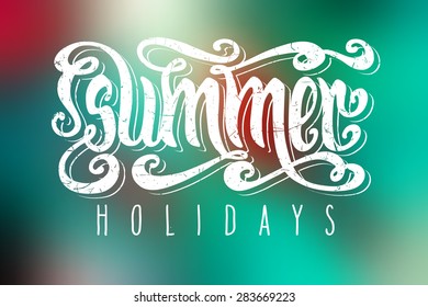 Hand drawn textured words 'Summer Holidays' over abstract smooth blur green background.