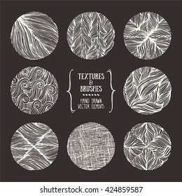 Hand drawn textures and brushes. Artistic collection of design elements: bubbles, brush strokes, wavy lines, abstract backgrounds, natural pattern made with ink. Isolated vector.