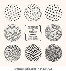 Hand drawn textures and brushes. Artistic collection of design elements: strawberry, animal skin, fur, brush stroke, paint dab, wavy lines, stars, geometric pattern made with ink. Isolated vector set.