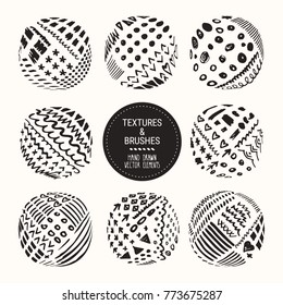 Hand drawn textures and brushes. Artistic collection of design elements:round labels, grunge lines, brush strokes, wavy lines, tribal backgrounds, geometric pattern made with ink. Isolated vector set.