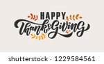 Hand drawn Thanksgiving typography poster. Celebration quote "Happy Thanksgiving" on textured background for postcard, autumn icon, logo or badge. Autumn vector vintage style calligraphy