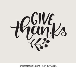 Hand drawn Thanksgiving typography poster. Celebration quote "Give Thanks" for postcard, autumn icon, logo or badge. Autumn vector  calligraphy.
