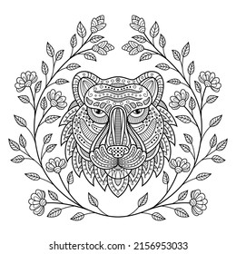 Hand drawn of tiger head with flower frame in zentangle style