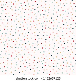 Hand drawn tiny tossed polka dot confetti seamless pattern. Traditional red green holiday all over print. Vector swatch