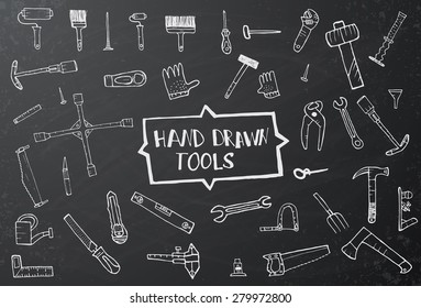 Hand drawn tool icons set on black chalk board. Vector illustration