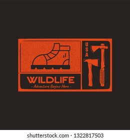 Hand drawn travel badge with hiking boot, axes and quote - Wildlife adventure begins here. Camping emblem patch in retro style. Stock vector wanderlust label. Monochrome stamp.