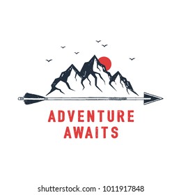 Hand drawn travel badge with mountains textured vector illustration and "Adventure awaits" inspirational lettering.