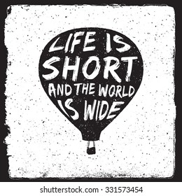 hand drawn travel inspirational quote, typography poster with air balloon silhouette. life is short and the world is wide. artwork for wear. vector illustration