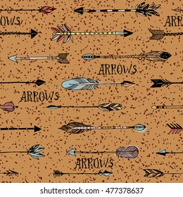 Hand drawn tribal arrows seamless patten with grunge background. Vector illustration.