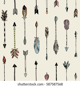 Hand drawn tribal arrows seamless patten on cream background. Vector illustration.