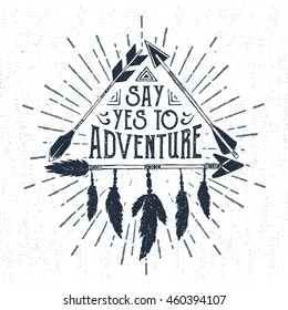 Hand drawn tribal badge with textured arrows triangle vector illustration and "Say yes to adventure" lettering.