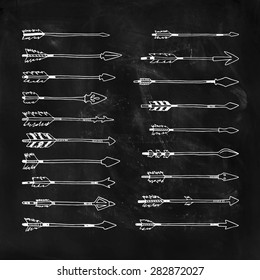 Hand drawn tribal collection with arrows  for design hipster logo and more. Vector tribal, ethnic, aztec elements isolated on chalkboard