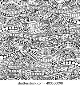 Hand drawn tribal ethnic pattern. Doodle background with doodles, flowers and mandalas. Black and white.