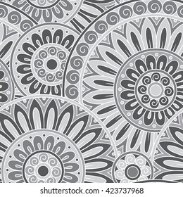 Hand drawn tribal ethnic pattern. Doodle background with doodles, flowers and mandalas.