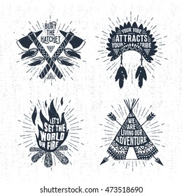 Hand drawn tribal labels set with tomahawks, headdress, bonfire, and teepee vector illustrations and inspirational lettering.