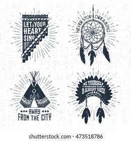 Hand drawn tribal labels set with pan flute, dream catcher, teepee, and headdress vector illustrations and inspirational lettering.