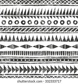 Hand drawn tribal pattern. Primitive geometric background in grunge style. EPS10 vector illustration. Contains no transparency and blending modes. 