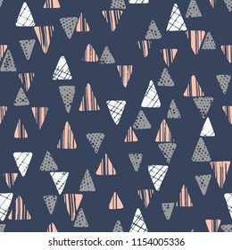 Hand drawn tribal textured triangles on dark blue background vector seamless pattern. Ethnic abstract geometric drawing