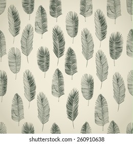 Hand drawn tropical palm leaves. Seamless background.