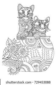 Hand drawn two kittens. Sketch for anti-stress adult coloring book in zen-tangle style. Vector illustration  for coloring page.