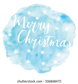 Hand drawn typography card. Merry christmas greetings hand-lettering on watercolor blue background. Vector illustration.