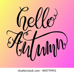 Hand drawn typography lettering phrase "hello autumn" isolated on the color background. Fun calligraphy for typography greeting and invitation card.