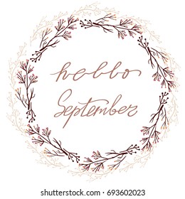 Hand drawn typography lettering phrase Hello September isolated on the white background with wreath for photo, greeting and invitation card or print design