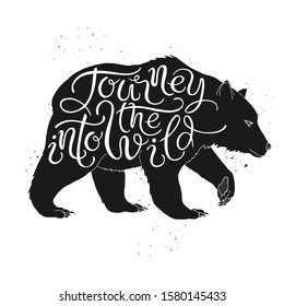 Hand drawn typography poster. Brush lettering inspiration quote placed in a form of a bear and saying Journey into the Wild. Great for posters, greeting cards.