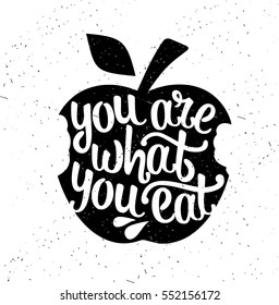 Hand drawn typography poster. Inspirational vector typography. You Are What You Eat. Vector calligraphy.