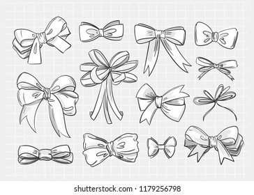 Hand drawn various bow ties. Black and white vector set. Checked background. All elements are isolated