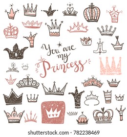 Hand drawn Various crowns set, vector illustration doodle cute style. 