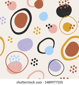 Hand drawn various round and elipse shapes and dots. Doodle objects. Abstract contemporary modern trendy vector illustration. Seamless pattern. Pastel colors. Perfect for textile prints