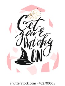 Hand drawn vector abstract artistic textured illustration with handwritten modern ink lettering phase Get your witchy on and witch hat isolated on white background.