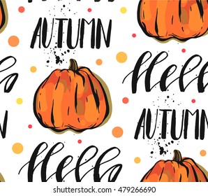 Hand drawn vector abstract autumn seamless pattern with pumpkin and handwritten lettering phase hello autumn on polka dot background isolated on white.