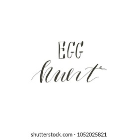 Hand drawn vector abstract graphic scandinavian Happy Easter cute greeting card template with Egg hunt handwritten calligraphy phases text isolated on white background.