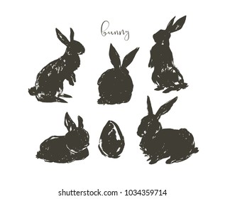 Hand drawn vector abstract ink sketch graphic drawing scandinavian Happy Easter simple bunny illustrations sihouette collection set with freehand collage textures isolated on white background.