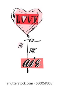 Hand drawn vector abstract Love greeting card design with balloon in heart shape and handwritten modern calligraphy phase Love is in the air in pastel colors isolated on white background.