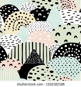 Hand drawn vector abstract scandinavian graphic illustration seamless pattern with hills and mountains. Nordic nature landscape concept. Perfect for kids fabric, textile, nursery wallpaper.