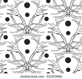 Hand drawn vector abstract seamless pattern with graphic deers antlers and polka dots isolated on white background.Wildlife concept.Unique simple pattern for wrapping,decoration and fashion fabric.