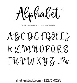 Hand drawn vector alphabet, font. Isolated letters, punctuation written with marker or ink. Modern brush script.