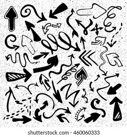Hand drawn vector arrows icons set isolated on white background with ink splashes