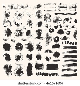 Hand drawn vector brush strokes and grunge textures made with ink. Artistic collection: chalk strokes, dabs of paint, smear patterns, dirty brushes, abstract splatters. Isolated design elements.