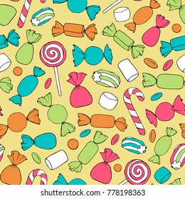 Hand drawn vector candies, canes and marshmallows seamless pattern on the yellow background. Holiday decoration in bright colors.