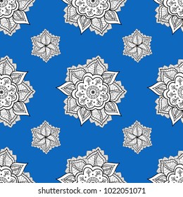 Hand drawn vector colored Mandala seamless pattern. Arabic, indian, turkish and ottoman culture decoration style. Ethnic ornament on blue, white and black colors. Magic vintage template of greeting.