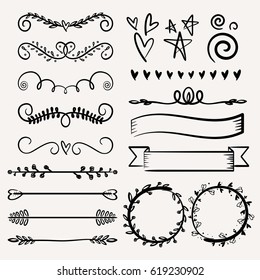 Hand drawn vector dividers. Lines, borders and laurels set. Doodle design elements.