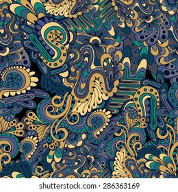 Hand drawn vector doodles seamless pattern in blue and yellow colors.